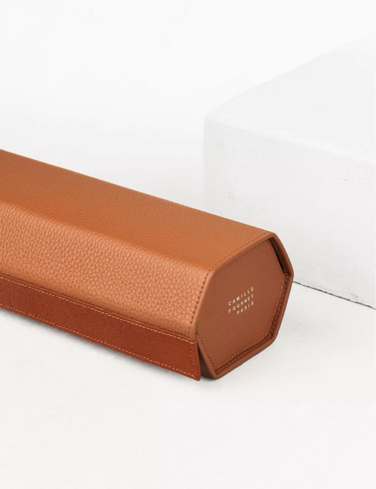 34.33  Triple watch case by Camille Fournet