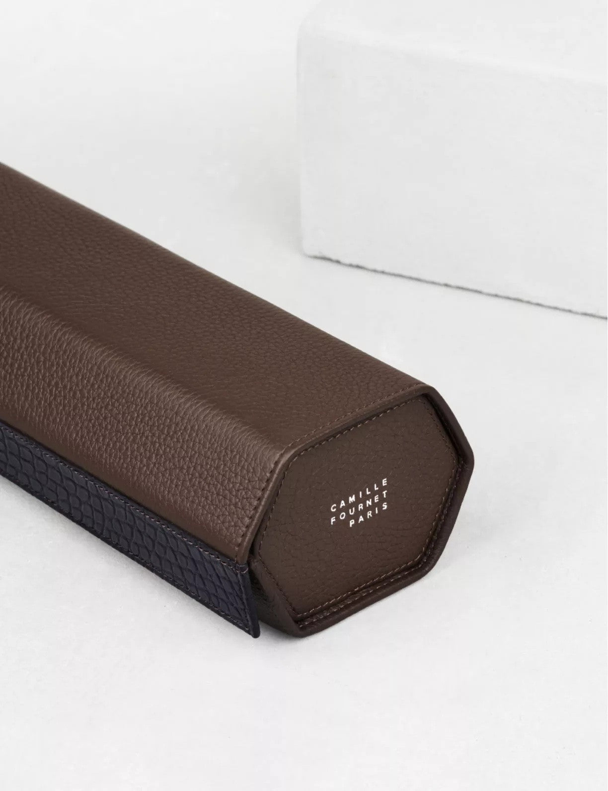 34.33  Triple watch case by Camille Fournet